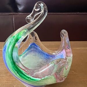 Handblown glass Swan. Measures 5 1/4”tall and 4” across.